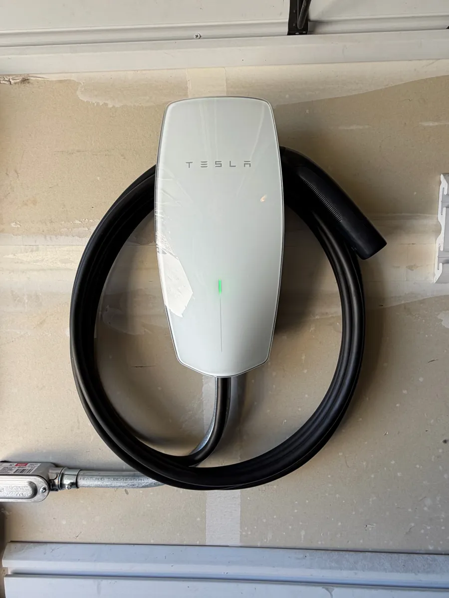 Tesla Wall Connector installed in a garage